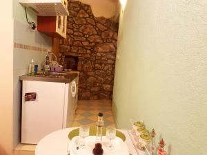 Η κουζίνα ή μικρή κουζίνα στο Cottage Melita the Apartment for Animal Lovers