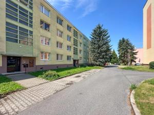 an empty street in front of a building at Apartmán/byt Liptovský Mikuláš in Liptovský Mikuláš