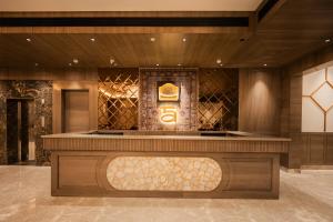 a lobby with a reception desk in a building at Ananta Express, Katra in Katra