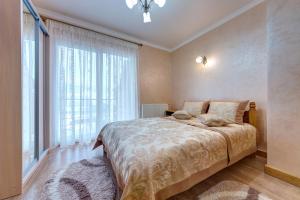 Letto o letti in una camera di Villa Anet