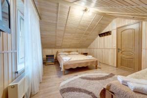 Letto o letti in una camera di Villa Anet