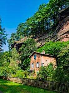 a house on the side of a mountain at chambre ZEN home Sérénité in Hazelbourg