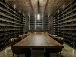 a conference room with a wooden table and chairs at Torre Zambra RESORT in Villamagna +45 photos