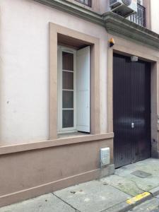 a building with a door and a window on it at Albi-Suite in Albi