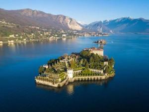 an island in the middle of a large body of water at Casa vacanze by Michele in Verbania