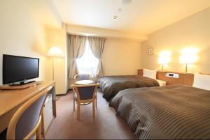 TV a/nebo společenská místnost v ubytování Hotel Morschein