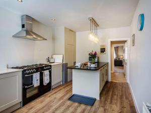 a kitchen with a stove and a counter top at 2 Bed in Harrogate oc-88933 in Pateley Bridge