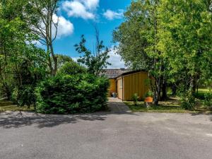 a house in the middle of a yard with trees at 1 Bed in Weymouth oc-78865 in Weymouth