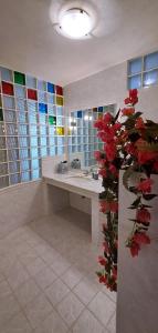 a bathroom with a sink and a large mirror at Casa Blu Mare privat beach 9 person in San Nicola Arcella +40 photos