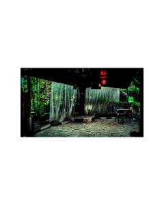 a stage with a waterfall in a forest at Hôtel Saint Jean Leopold in Kigali