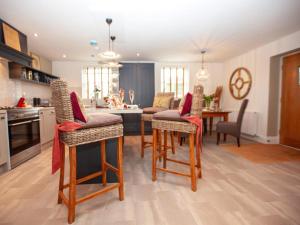 a kitchen with a table and chairs in a kitchen at 2 Bed in Harrogate oc-75642 in Summer Bridge