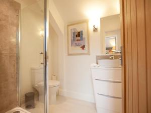 a bathroom with a toilet and a sink and a shower at 2 Bed in Harrogate oc-75642 in Summer Bridge +21 photos