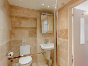 a bathroom with a toilet and a sink at 1 Bed in Wedmore oc-51341 in Chapel Allerton +14 photos