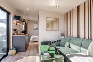 a living room with a couch and a table at 1 Bed in Austwick oc-b37509 in Austwick