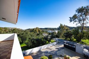 a view from the balcony of a house at Natural Quiet Accommodation 2 - Faliraki in Kalithies