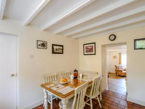 a kitchen and dining room with a table and chairs at 2 Bed in Malton oc-78794 in Norton