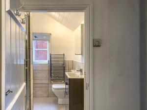 a bathroom with a toilet and a sink at 2 Bed in Malton oc-78794 in Norton +13 photos
