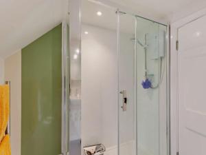 a shower with a glass door in a bathroom at 1 Bed in Bristol oc-95178 in Blagdon +12 photos