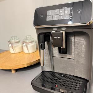 a coffee maker sitting on top of a counter at EVIS LTD apartments 4 in Rēzekne