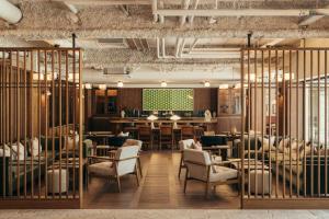 a rendering of a restaurant with tables and chairs at The Gleneagles Hotel in Auchterarder