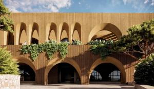 a building with arches on the side of it at Nômade Temple Ibiza - New Opening in Portinatx