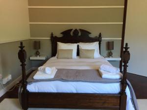 Cama ou camas em um quarto em Casa Do Populo