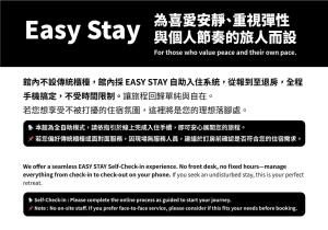 a poster with chinese writing on at Pet Friendly Taitung Chun Yang Smart Stay in Taitung City
