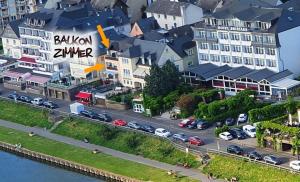 a model of a city with cars on a street at Pension Regina in Cochem +42 photos