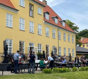 a group of people standing in front of a building at Anneberg Gæstehus in Nykøbing Sjælland