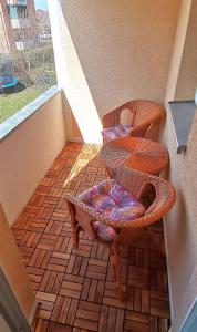 a chair sitting on top of a balcony at DEBSI vacation rental in Bad Windsheim