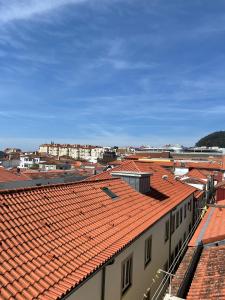 a view of a city with red roofs at Private Room in Old Town in Viana do Castelo