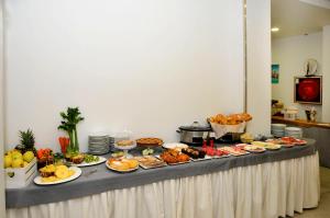 a buffet with many different types of food on a table at Hotel Venezia in Caorle