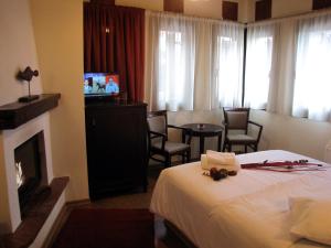 TV a/nebo společenská místnost v ubytování Hotel Mirovoli
