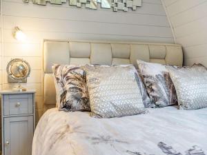 a bedroom with a bed with pillows on it at 1 Bed in Consett oc-87933 in Shotley Bridge