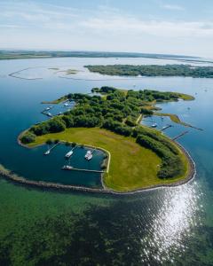 an aerial view of a small island in the water at Guesthouse Ouddorp Connection in Ouddorp