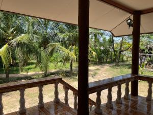 a view from the porch of a house at Yao noi cozy home in Ko Yao Noi