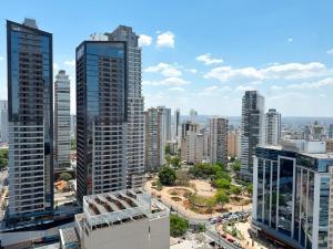 an aerial view of a city with tall buildings at Flat Lounge 22 Setor Oeste in Goiânia
