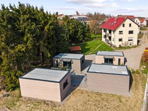 an overhead view of a house with four roofs at Holiday&Stay, Tiny living in Fronreute