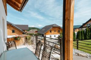a view from the balcony of a house at Feriendorf Edelweiss in Mariapfarr