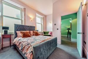 a bedroom with a bed with a large window at 2 Bed in Coldstream oc-t30042 in Coldstream