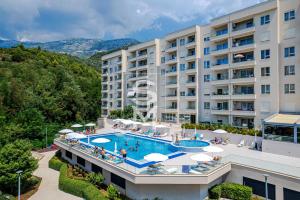 an aerial view of a hotel with a swimming pool at Status-M Apartments 85 in Bečići