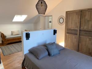 a bedroom with a bed in a room at Large period house with panoramic view in Canari