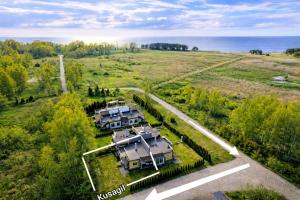 an aerial view of a group of houses in a field at Kusagil Nature & Sauna near Pärnu in Tahkuranna