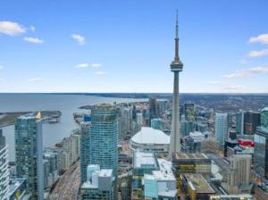 an aerial view of a city with the cn tower at Luxury Cityscape Condo in Toronto