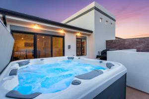 a hot tub in the middle of a house at Sunny Springs, Hurricane, Ut in Hurricane