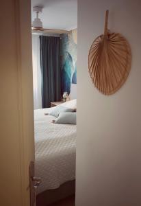 a bedroom with a bed and a room with at Light Blue Apartment Orihuela Costa in Orihuela Costa +33 photos