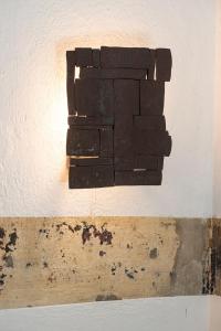 a pile of bricks hanging on a wall at Zur Waldschmiede in Kakenstorf