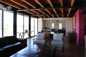 a living room with a couch and a table at Casa Ancestra in Santa Cruz