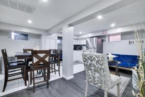 a kitchen and dining room with a table and chairs at 4BR Newark Stay w/ Parking And Fast Wi-Fi in Newark +11 photos