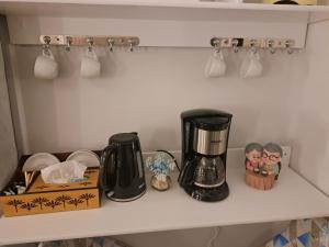 Facilități de preparat ceai și cafea la Elite suites